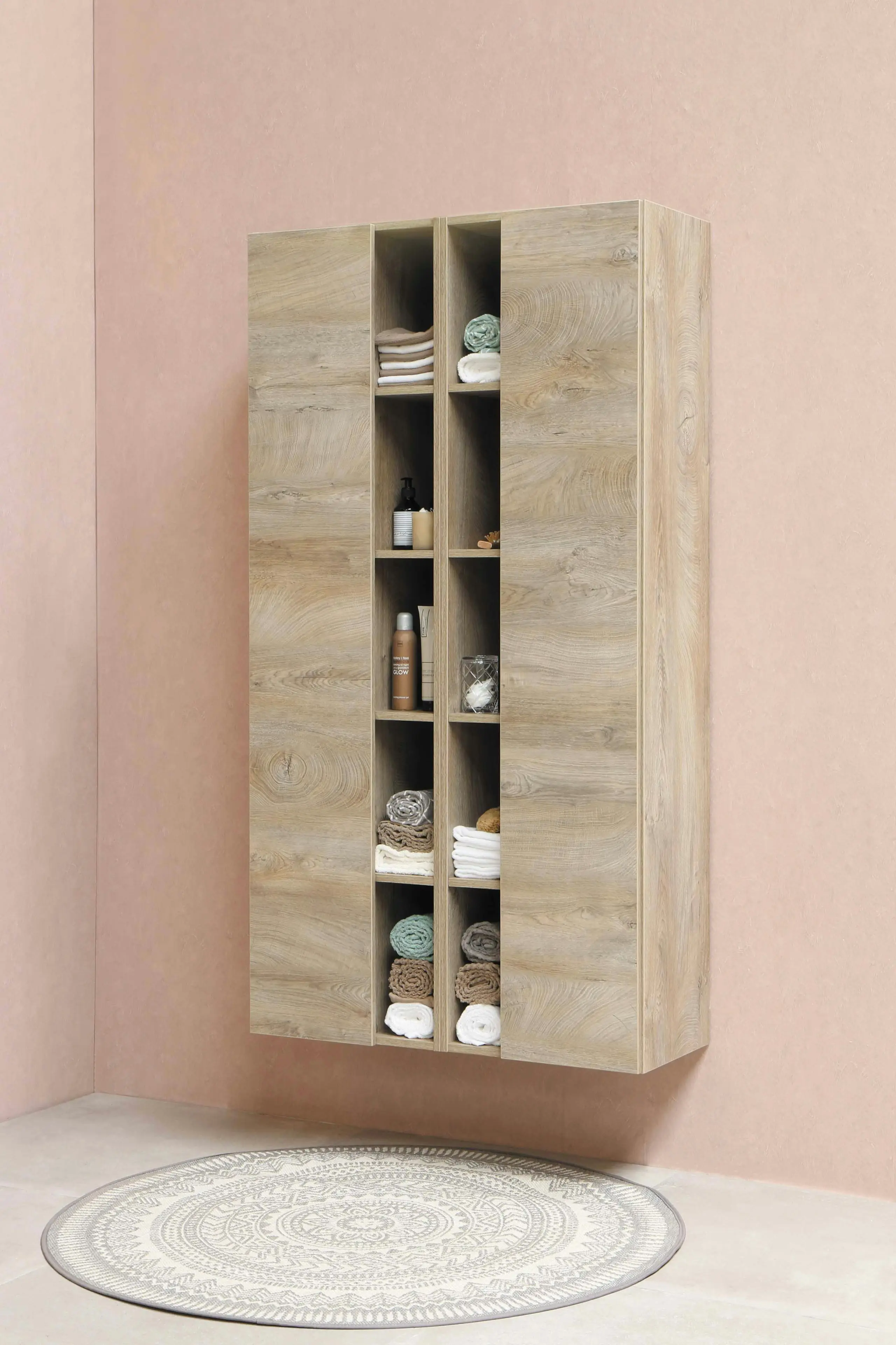 Tall wardrobe unit with open display shelves in a wood finish